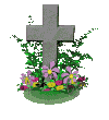 cross grave with flowers